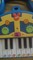 Vendo piano mickey con partituras ,9 e