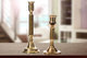 Lote dos candelabros antiguos de latón