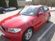 BMW 116i rojo - Foto 1